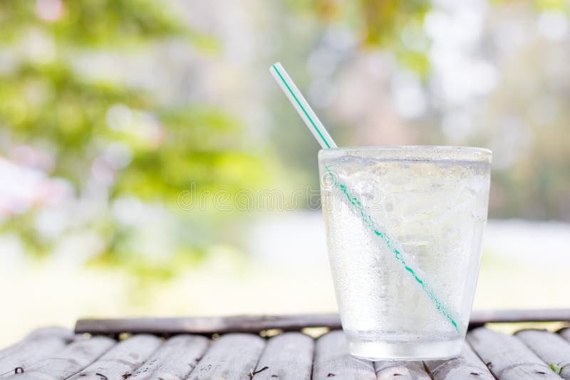 Cold water glass on wood stock photo. Image of refreshing 116373262