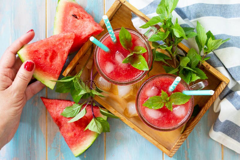 Cold Watermelon Smoothie. Summer Watermelon drink in glasses and slices of watermelon