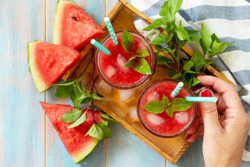 Cold Watermelon Smoothie. Summer Watermelon drink in glasses and slices of watermelon