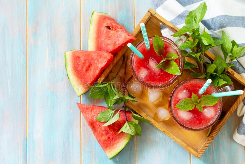 Cold Watermelon Smoothie. Summer Watermelon drink in glasses and slices of watermelon