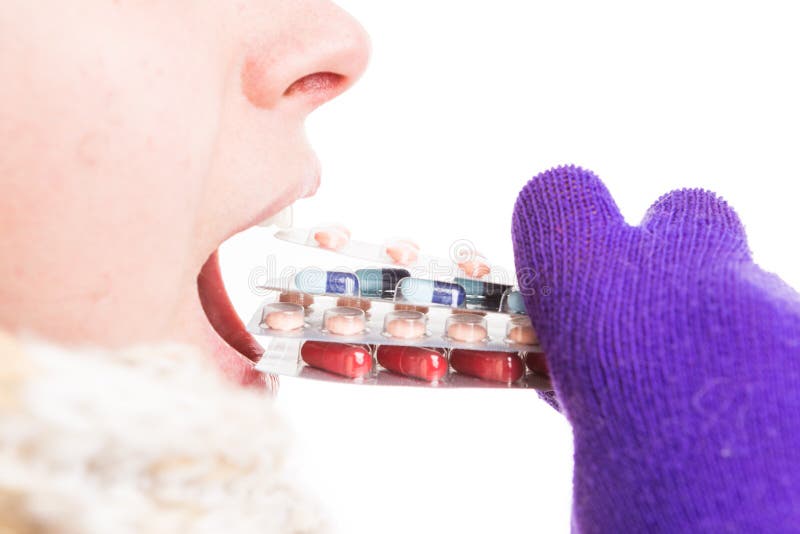 Cold woman taking many pills as medicine abuse concept royalty free stock image Cold woman taking many pills as medicine abuse concept royalty free stock image