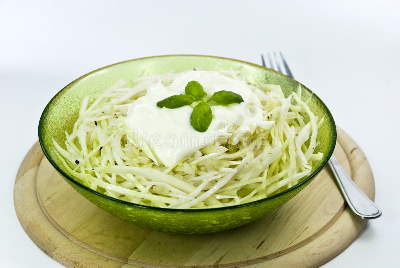 A cole cream salad with caper and pepper-cutted