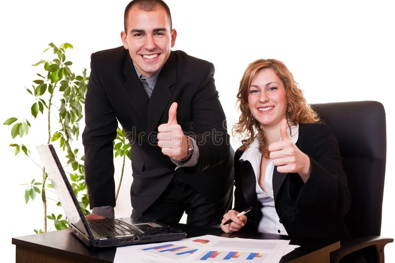 Satisfied young business colleagues smiling with thumbs up. Satisfied young business colleagues smiling with thumbs up