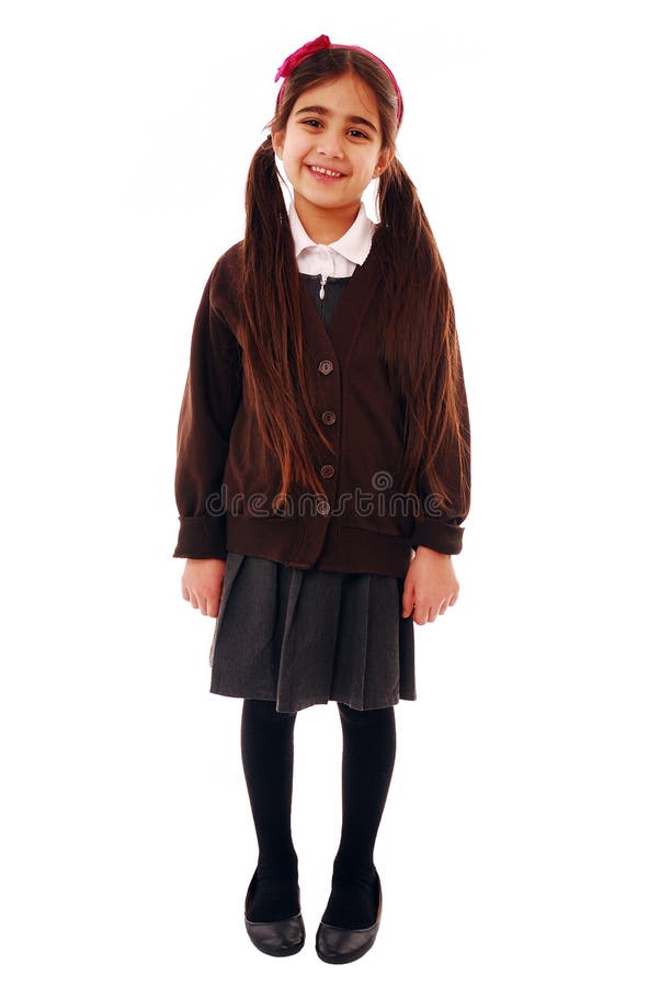 Asian schoolkid smiling isolated on white. Asian schoolkid smiling isolated on white