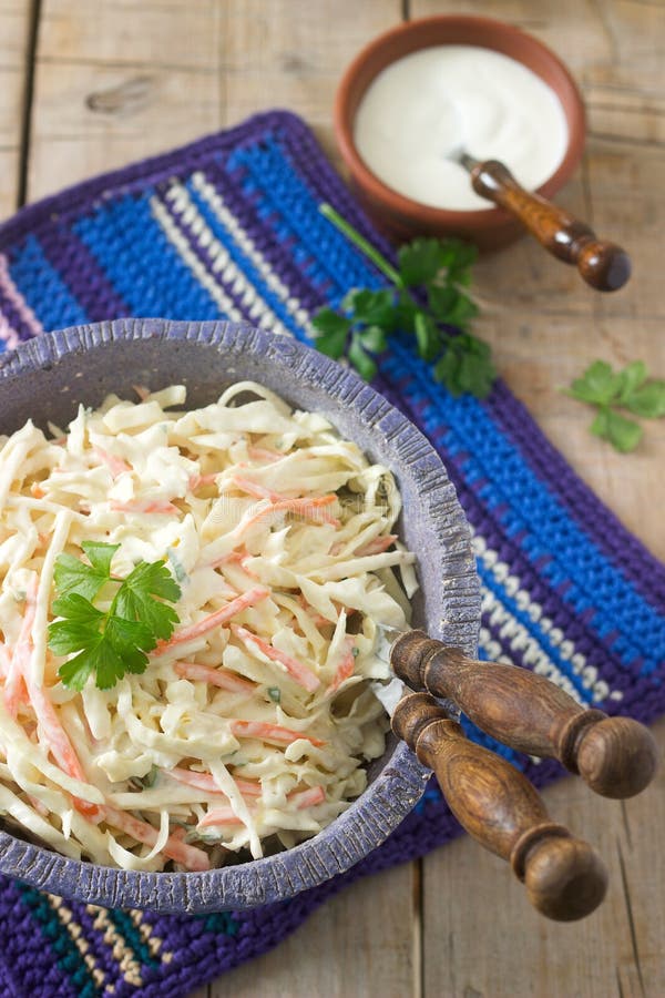 Coleslaw Salad from Cabbage and Carrots with Dressing Mayonnaise. Stock