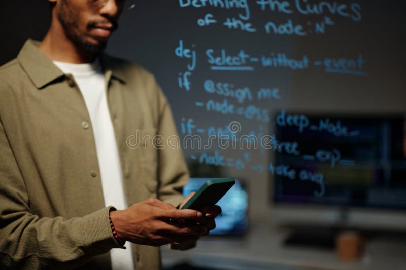Collaborating on Coding Project in Modern Workspace royalty free stock photos