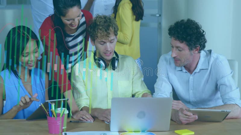 Collaborating in office, diverse team using laptops with animation data overlay stock video