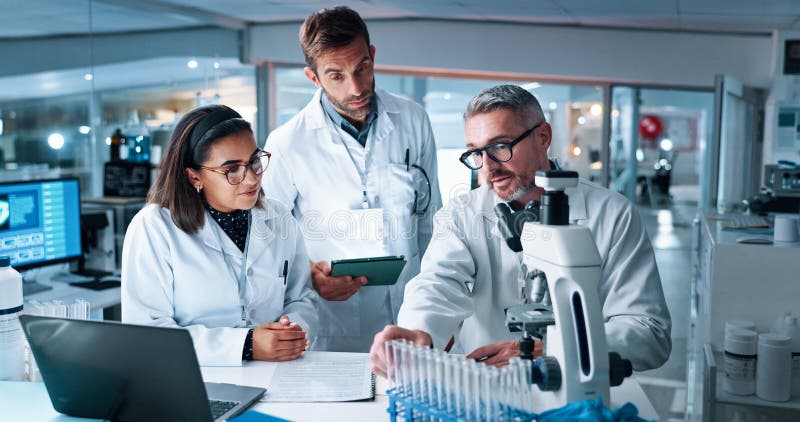 Collaboration, medical and science with people in laboratory together for breakthrough or development. Laptop royalty free stock photography