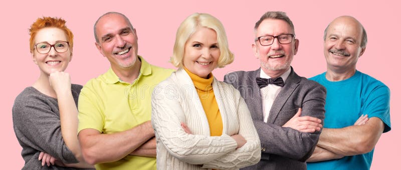 Senior confident smiling men and women posing with folded arms stock photography Senior confident smiling men and women posing with folded arms stock photography