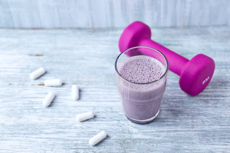 Collagen powder, Proline capsules and Vitamin C tablets. Sports supplements. royalty free stock photography Collagen powder, Proline capsules and Vitamin C tablets. Sports supplements. royalty free stock photography