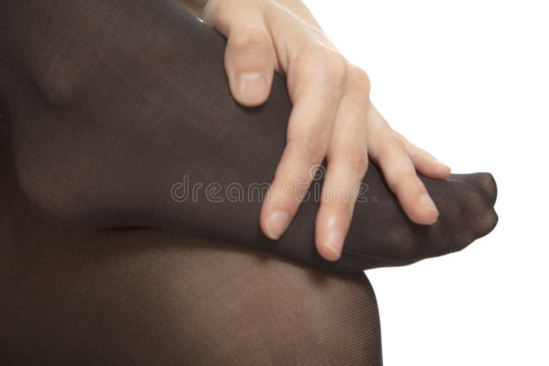 Collant dello sfregamento di dolore delle dita del piede immagine stock libera da diritti Collant dello sfregamento di dolore delle dita del piede immagine stock libera da diritti