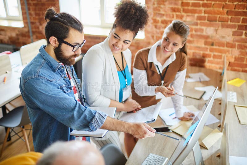 Colleagues discussing data royalty free stock photos