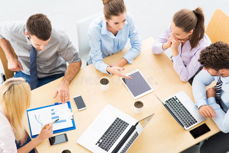 Colleagues working in office, high angle royalty free stock photo