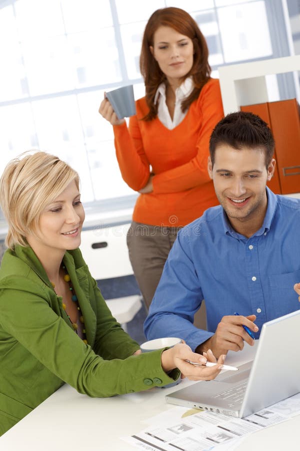 Colleagues working together royalty free stock photography