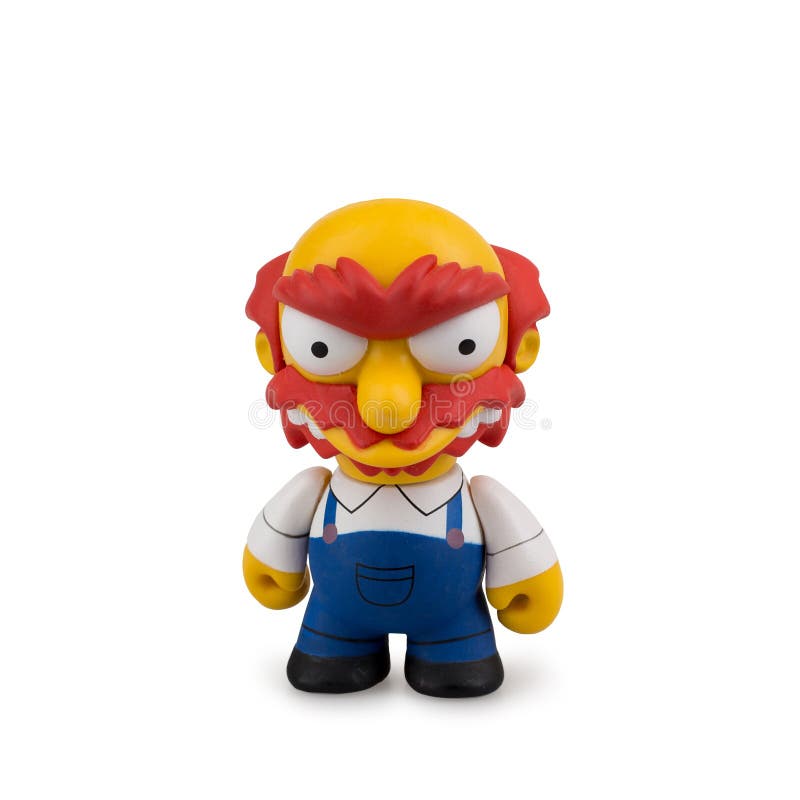 Collectible игрушка от мультфильма Simpsons на белой предпосылке стоковое фото rf Collectible игрушка от мультфильма Simpsons на белой предпосылке стоковое фото rf