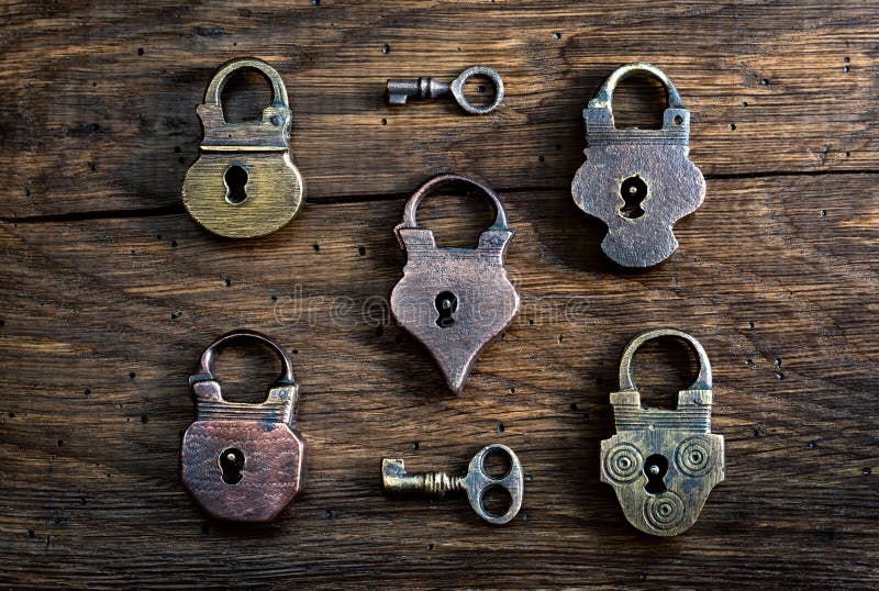 Collection of Antique Door Locks and Keys on an Old Board. Vintage