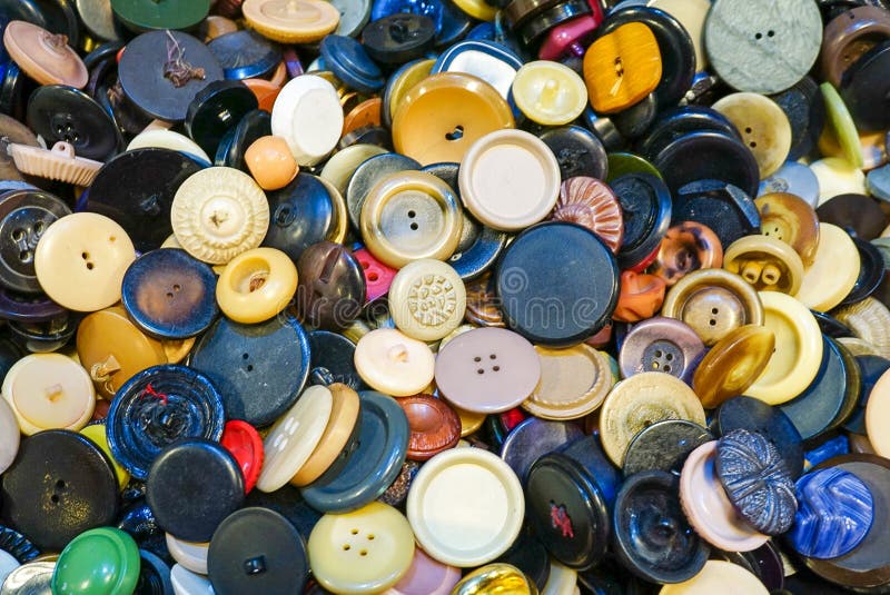 A collection of an assortment of colorful buttons stock photography