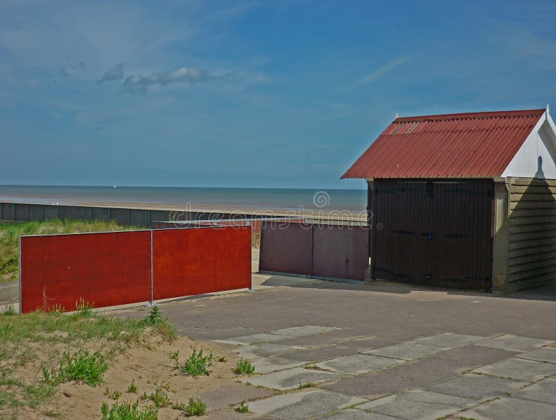 A Collection of Beach Huts, Sutton on Sea. Stock Photo Image of huts
