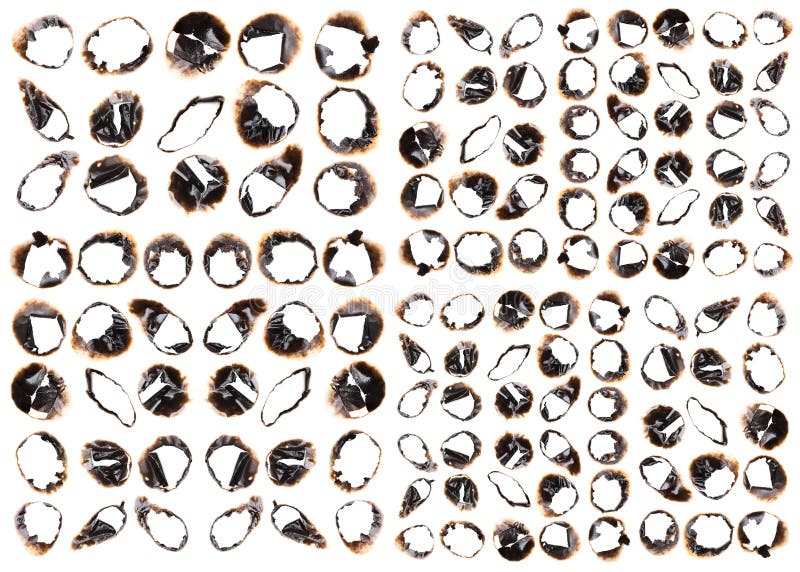 Collection of burnt holes in a piece of paper isolated on white stock photography Collection of burnt holes in a piece of paper isolated on white stock photography
