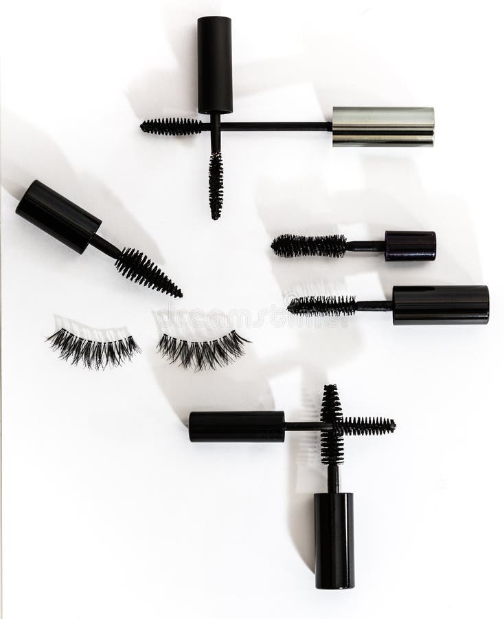 Collection of Different Mascara Brushes on a White Background. Stock