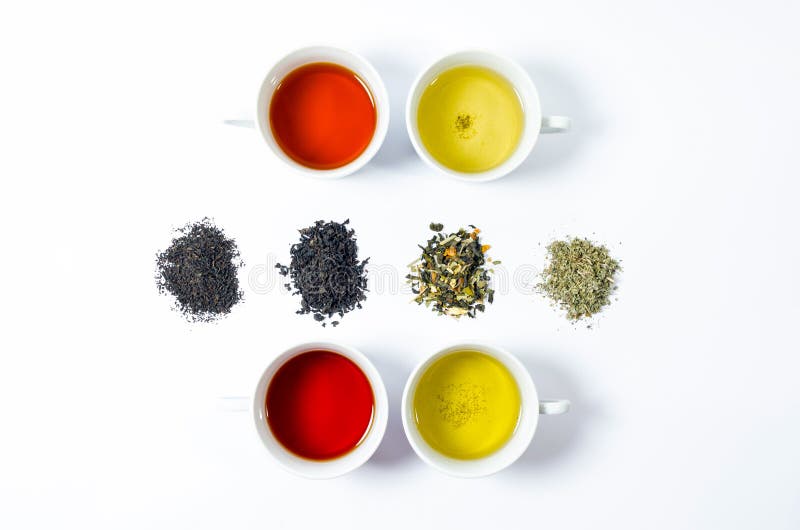 Collection of Different Teas in Cups with Tea Leaves on a White
