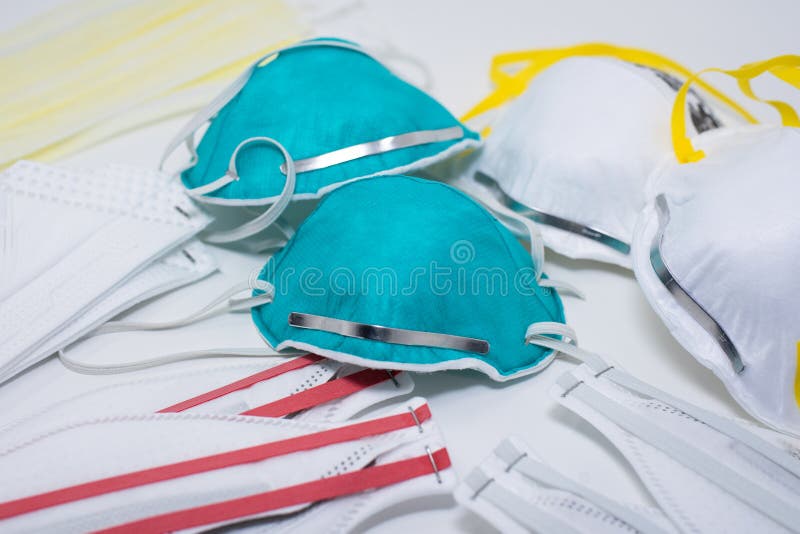 Collection of different types of N95 respirators mask stock images