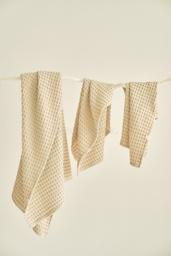 Collection of Natural Muslin Kitchen Towels are Hung in a Row on an Unusual  Wooden Hanger. Natural, Soft, Airy and Stock Image - Image of material,  fiber: 215370293