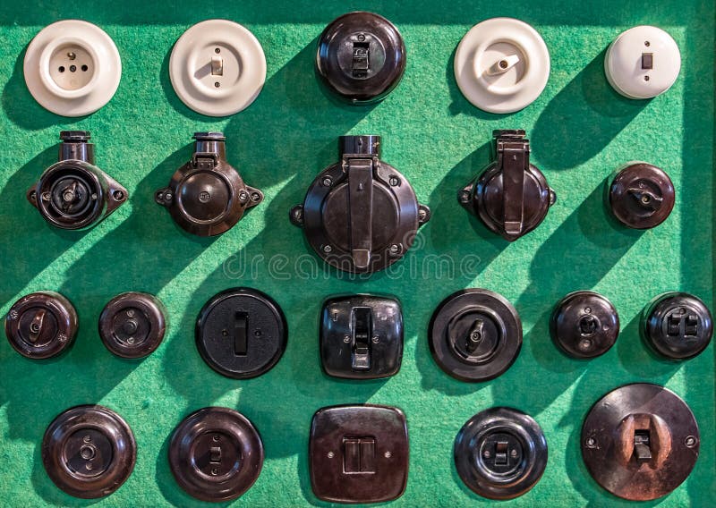 Collection of old electrical sockets and switches royalty free stock images