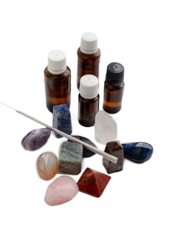 Collection of Semiprecious Stones and Aroma Oils on Isolated White