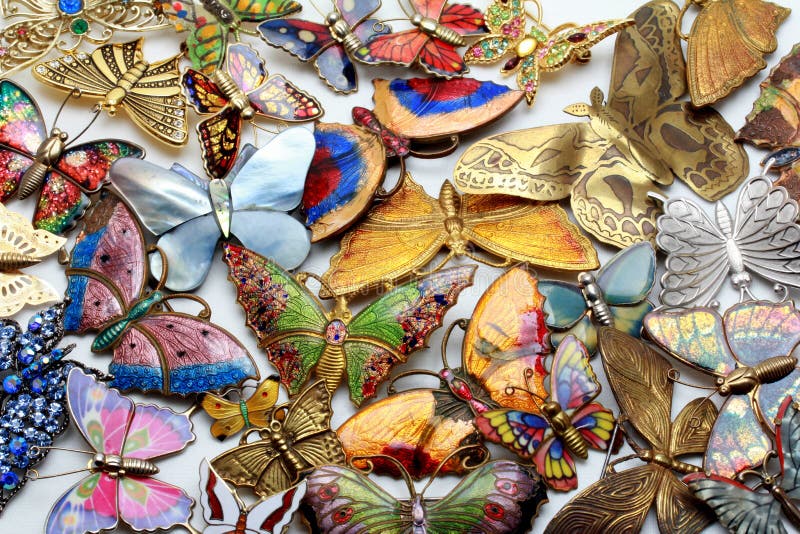 Large collection of multi colored enameled butterfly brooches. Mostly enameled or etched tin or base metal, one may be made of abalone or similar shellfish. Large collection of multi colored enameled butterfly brooches. Mostly enameled or etched tin or base metal, one may be made of abalone or similar shellfish.