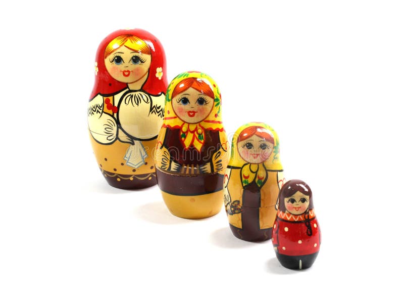 Collection of Wooden Nesting Stacking Dolls on White Background Stock