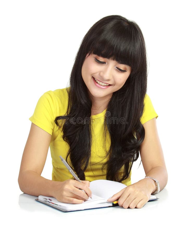 College asian girl writing a book