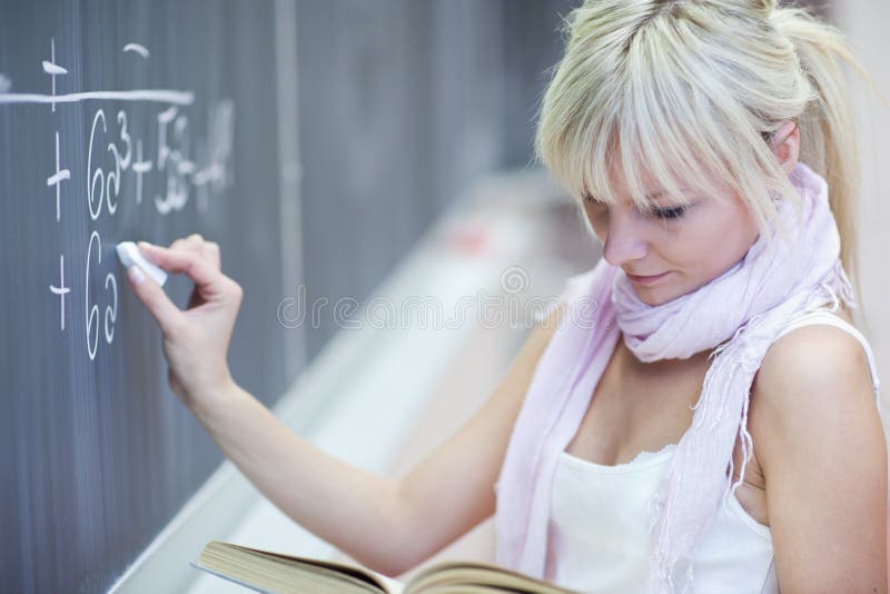 College student erasing the chalkboard