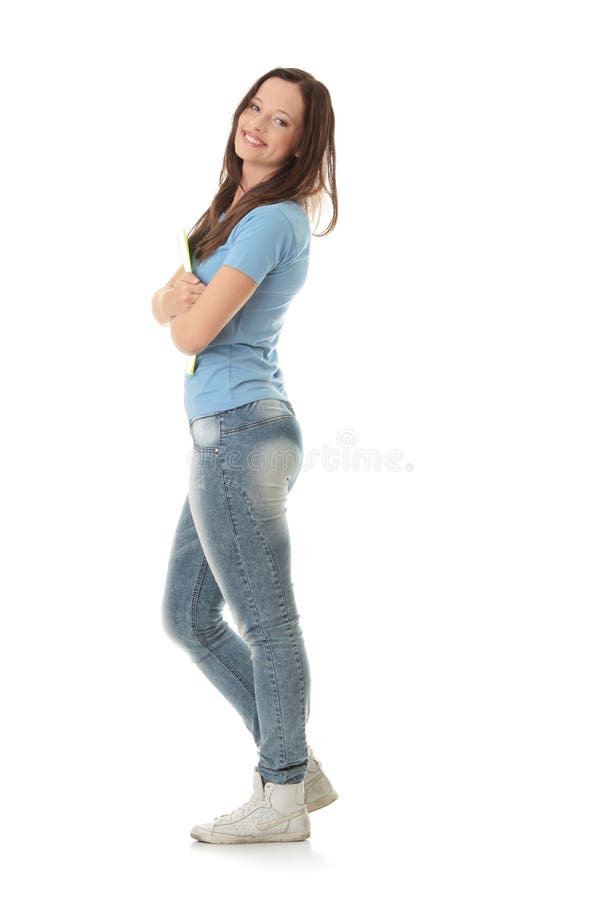 Side View of Young Attractive Woman in Gray Sleeveless Top and Blue Jeans  Standing with Arms at Sides Isolated on White Stock Image - Image of  isolated, positive: 144812513