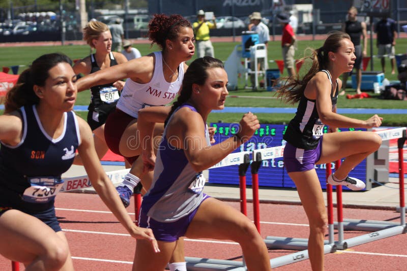 College women running hurdle race royalty free stock image College women running hurdle race royalty free stock image