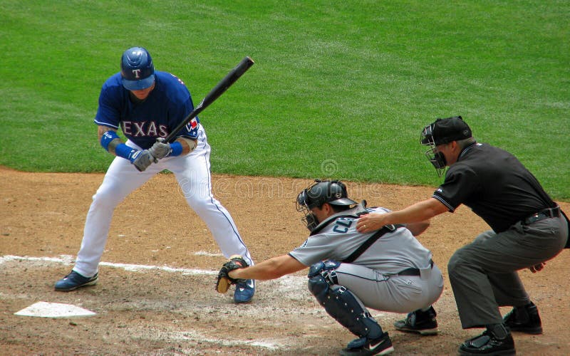 Collettore ed arbitro della pastella di baseball immagine stock Collettore ed arbitro della pastella di baseball immagine stock