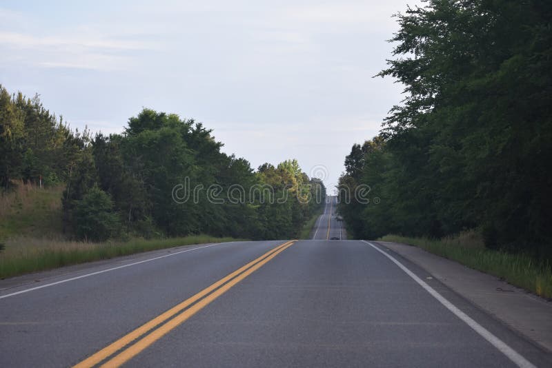 This is Hwy 259 headed South toward Beavers Bend in Oklahoma. Eastern Oklahoma and Western Arkansas has some great Country for a great getaway drive. This is Hwy 259 headed South toward Beavers Bend in Oklahoma. Eastern Oklahoma and Western Arkansas has some great Country for a great getaway drive.