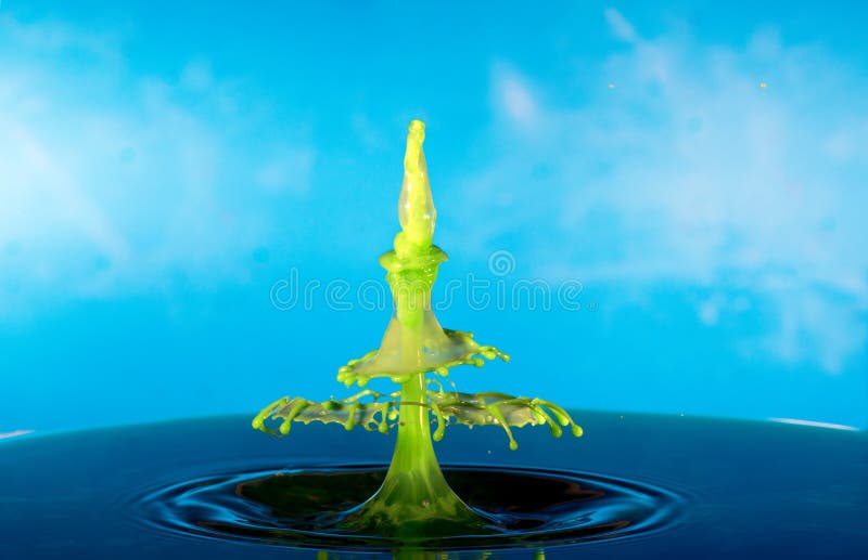 Collision of two drops on a surface of water stock image Collision of two drops on a surface of water stock image