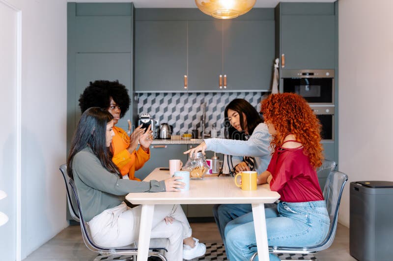 Coworkers having a coffee break together in the office. Business concept. Coworkers having a coffee break together in the office. Business concept.