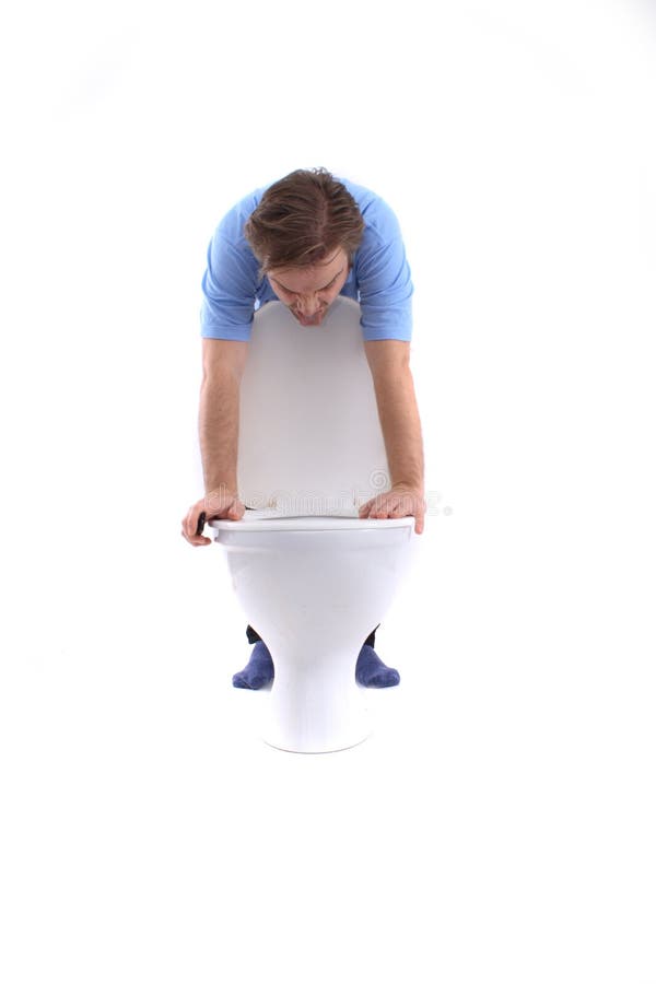 Gagging man at toilet isolated on the white background. Gagging man at toilet isolated on the white background