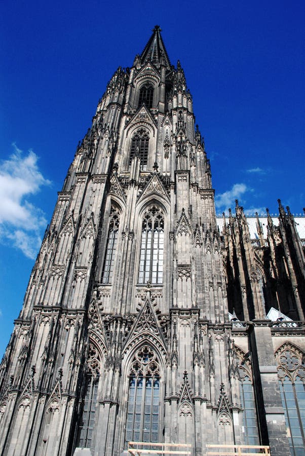 Cologne Cathedral (Kolner Dom, official name Hohe Domkirche St. Peter und Maria) is one of the best-known architectural monuments in Germany and has been Cologne's (Koln's) most famous landmark since its completion in the late 19th century. The cathedral is under the administration of the Roman Catholic Church and is the seat of the Archbishop of Cologne. From 1880, when its spires were completed, it was the world's tallest structure, losing its title on the completion of the Washington Monument in Washington DC, 1884. Cologne Cathedral remains the second-tallest Gothic structure in the world; only the steeple of the Ulm Munster is higher. Construction of the gothic church began in 1248 and took, with interruptions, more than 600 years to complete - it was finally finished in 1880. The two towers are 157m tall, the cathedral is 144m long and 86m wide. The cathedral is dedicated to Saints Peter and Mary. It was built on the site of a 4th century Roman temple, a square edifice known as the 'oldest cathedral' and commissioned by Maternus, the first Christian bishop of Cologne. A second church built on the site, the so-called Old Cathedral, was completed in 818. This burned down on April 30, 124