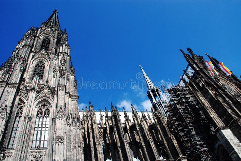 Cologne Cathedral (Kolner Dom, official name Hohe Domkirche St. Peter und Maria) is one of the best-known architectural monuments in Germany and has been Cologne's (Koln's) most famous landmark since its completion in the late 19th century. The cathedral is under the administration of the Roman Catholic Church and is the seat of the Archbishop of Cologne. From 1880, when its spires were completed, it was the world's tallest structure, losing its title on the completion of the Washington Monument in Washington DC, 1884. Cologne Cathedral remains the second-tallest Gothic structure in the world; only the steeple of the Ulm Munster is higher. Construction of the gothic church began in 1248 and took, with interruptions, more than 600 years to complete - it was finally finished in 1880. The two towers are 157m tall, the cathedral is 144m long and 86m wide. The cathedral is dedicated to Saints Peter and Mary. It was built on the site of a 4th century Roman temple, a square edifice known as the 'oldest cathedral' and commissioned by Maternus, the first Christian bishop of Cologne. A second church built on the site, the so-called Old Cathedral, was completed in 818. This burned down on April 30, 124. Cologne Cathedral (Kolner Dom, official name Hohe Domkirche St. Peter und Maria) is one of the best-known architectural monuments in Germany and has been Cologne's (Koln's) most famous landmark since its completion in the late 19th century. The cathedral is under the administration of the Roman Catholic Church and is the seat of the Archbishop of Cologne. From 1880, when its spires were completed, it was the world's tallest structure, losing its title on the completion of the Washington Monument in Washington DC, 1884. Cologne Cathedral remains the second-tallest Gothic structure in the world; only the steeple of the Ulm Munster is higher. Construction of the gothic church began in 1248 and took, with interruptions, more than 600 years to complete - it was finally finished in 1880. The two towers are 157m tall, the cathedral is 144m long and 86m wide. The cathedral is dedicated to Saints Peter and Mary. It was built on the site of a 4th century Roman temple, a square edifice known as the 'oldest cathedral' and commissioned by Maternus, the first Christian bishop of Cologne. A second church built on the site, the so-called Old Cathedral, was completed in 818. This burned down on April 30, 124