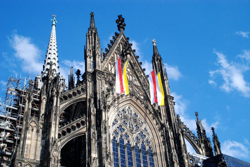 Cologne Cathedral (Kolner Dom, official name Hohe Domkirche St. Peter und Maria) is one of the best-known architectural monuments in Germany and has been Cologne's (Koln's) most famous landmark since its completion in the late 19th century. The cathedral is under the administration of the Roman Catholic Church and is the seat of the Archbishop of Cologne. From 1880, when its spires were completed, it was the world's tallest structure, losing its title on the completion of the Washington Monument in Washington DC, 1884. Cologne Cathedral remains the second-tallest Gothic structure in the world; only the steeple of the Ulm Munster is higher. Construction of the gothic church began in 1248 and took, with interruptions, more than 600 years to complete - it was finally finished in 1880. The two towers are 157m tall, the cathedral is 144m long and 86m wide. The cathedral is dedicated to Saints Peter and Mary. It was built on the site of a 4th century Roman temple, a square edifice known as the 'oldest cathedral' and commissioned by Maternus, the first Christian bishop of Cologne. A second church built on the site, the so-called Old Cathedral, was completed in 818. This burned down on April 30, 124. Cologne Cathedral (Kolner Dom, official name Hohe Domkirche St. Peter und Maria) is one of the best-known architectural monuments in Germany and has been Cologne's (Koln's) most famous landmark since its completion in the late 19th century. The cathedral is under the administration of the Roman Catholic Church and is the seat of the Archbishop of Cologne. From 1880, when its spires were completed, it was the world's tallest structure, losing its title on the completion of the Washington Monument in Washington DC, 1884. Cologne Cathedral remains the second-tallest Gothic structure in the world; only the steeple of the Ulm Munster is higher. Construction of the gothic church began in 1248 and took, with interruptions, more than 600 years to complete - it was finally finished in 1880. The two towers are 157m tall, the cathedral is 144m long and 86m wide. The cathedral is dedicated to Saints Peter and Mary. It was built on the site of a 4th century Roman temple, a square edifice known as the 'oldest cathedral' and commissioned by Maternus, the first Christian bishop of Cologne. A second church built on the site, the so-called Old Cathedral, was completed in 818. This burned down on April 30, 124