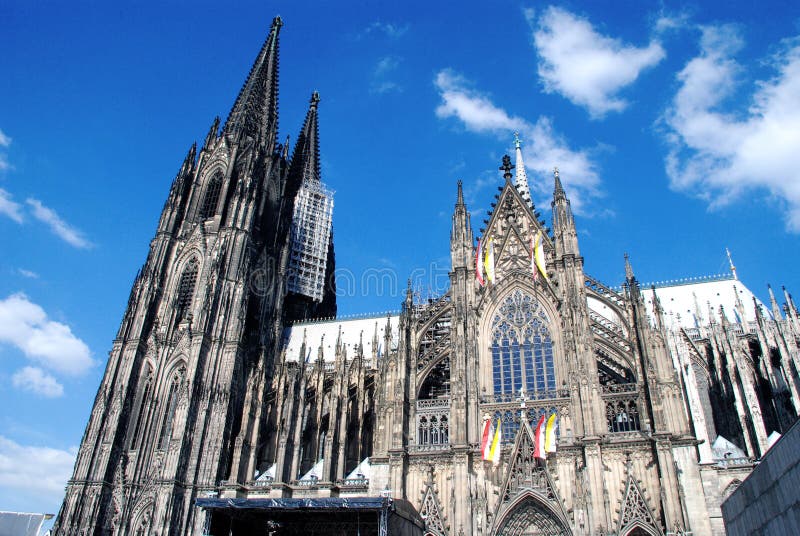 Cologne Cathedral (Kolner Dom, official name Hohe Domkirche St. Peter und Maria) is one of the best-known architectural monuments in Germany and has been Cologne's (Koln's) most famous landmark since its completion in the late 19th century. The cathedral is under the administration of the Roman Catholic Church and is the seat of the Archbishop of Cologne. From 1880, when its spires were completed, it was the world's tallest structure, losing its title on the completion of the Washington Monument in Washington DC, 1884. Cologne Cathedral remains the second-tallest Gothic structure in the world; only the steeple of the Ulm Munster is higher. Construction of the gothic church began in 1248 and took, with interruptions, more than 600 years to complete - it was finally finished in 1880. The two towers are 157m tall, the cathedral is 144m long and 86m wide. The cathedral is dedicated to Saints Peter and Mary. It was built on the site of a 4th century Roman temple, a square edifice known as the 'oldest cathedral' and commissioned by Maternus, the first Christian bishop of Cologne. A second church built on the site, the so-called Old Cathedral, was completed in 818. This burned down on April 30, 124. Cologne Cathedral (Kolner Dom, official name Hohe Domkirche St. Peter und Maria) is one of the best-known architectural monuments in Germany and has been Cologne's (Koln's) most famous landmark since its completion in the late 19th century. The cathedral is under the administration of the Roman Catholic Church and is the seat of the Archbishop of Cologne. From 1880, when its spires were completed, it was the world's tallest structure, losing its title on the completion of the Washington Monument in Washington DC, 1884. Cologne Cathedral remains the second-tallest Gothic structure in the world; only the steeple of the Ulm Munster is higher. Construction of the gothic church began in 1248 and took, with interruptions, more than 600 years to complete - it was finally finished in 1880. The two towers are 157m tall, the cathedral is 144m long and 86m wide. The cathedral is dedicated to Saints Peter and Mary. It was built on the site of a 4th century Roman temple, a square edifice known as the 'oldest cathedral' and commissioned by Maternus, the first Christian bishop of Cologne. A second church built on the site, the so-called Old Cathedral, was completed in 818. This burned down on April 30, 124