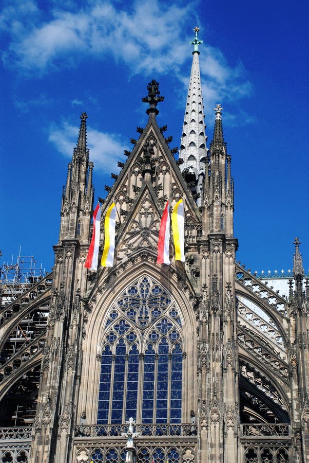 Cologne Cathedral (Kolner Dom, official name Hohe Domkirche St. Peter und Maria) is one of the best-known architectural monuments in Germany and has been Cologne's (Koln's) most famous landmark since its completion in the late 19th century. The cathedral is under the administration of the Roman Catholic Church and is the seat of the Archbishop of Cologne. From 1880, when its spires were completed, it was the world's tallest structure, losing its title on the completion of the Washington Monument in Washington DC, 1884. Cologne Cathedral remains the second-tallest Gothic structure in the world; only the steeple of the Ulm Munster is higher. Construction of the gothic church began in 1248 and took, with interruptions, more than 600 years to complete - it was finally finished in 1880. The two towers are 157m tall, the cathedral is 144m long and 86m wide. The cathedral is dedicated to Saints Peter and Mary. It was built on the site of a 4th century Roman temple, a square edifice known as the 'oldest cathedral' and commissioned by Maternus, the first Christian bishop of Cologne. A second church built on the site, the so-called Old Cathedral, was completed in 818. This burned down on April 30, 124. Cologne Cathedral (Kolner Dom, official name Hohe Domkirche St. Peter und Maria) is one of the best-known architectural monuments in Germany and has been Cologne's (Koln's) most famous landmark since its completion in the late 19th century. The cathedral is under the administration of the Roman Catholic Church and is the seat of the Archbishop of Cologne. From 1880, when its spires were completed, it was the world's tallest structure, losing its title on the completion of the Washington Monument in Washington DC, 1884. Cologne Cathedral remains the second-tallest Gothic structure in the world; only the steeple of the Ulm Munster is higher. Construction of the gothic church began in 1248 and took, with interruptions, more than 600 years to complete - it was finally finished in 1880. The two towers are 157m tall, the cathedral is 144m long and 86m wide. The cathedral is dedicated to Saints Peter and Mary. It was built on the site of a 4th century Roman temple, a square edifice known as the 'oldest cathedral' and commissioned by Maternus, the first Christian bishop of Cologne. A second church built on the site, the so-called Old Cathedral, was completed in 818. This burned down on April 30, 124