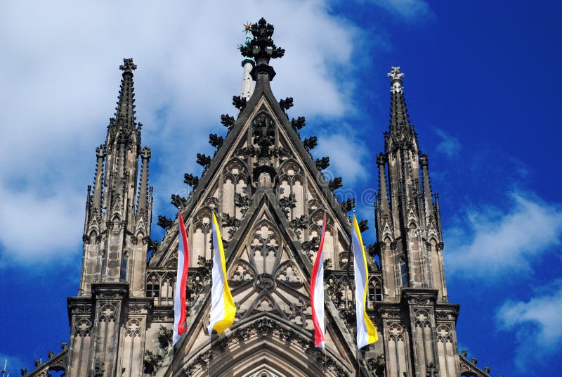 Cologne Cathedral (Kolner Dom, official name Hohe Domkirche St. Peter und Maria) is one of the best-known architectural monuments in Germany and has been Cologne's (Koln's) most famous landmark since its completion in the late 19th century. The cathedral is under the administration of the Roman Catholic Church and is the seat of the Archbishop of Cologne. From 1880, when its spires were completed, it was the world's tallest structure, losing its title on the completion of the Washington Monument in Washington DC, 1884. Cologne Cathedral remains the second-tallest Gothic structure in the world; only the steeple of the Ulm Munster is higher. Construction of the gothic church began in 1248 and took, with interruptions, more than 600 years to complete - it was finally finished in 1880. The two towers are 157m tall, the cathedral is 144m long and 86m wide. The cathedral is dedicated to Saints Peter and Mary. It was built on the site of a 4th century Roman temple, a square edifice known as the 'oldest cathedral' and commissioned by Maternus, the first Christian bishop of Cologne. A second church built on the site, the so-called Old Cathedral, was completed in 818. This burned down on April 30, 124. Cologne Cathedral (Kolner Dom, official name Hohe Domkirche St. Peter und Maria) is one of the best-known architectural monuments in Germany and has been Cologne's (Koln's) most famous landmark since its completion in the late 19th century. The cathedral is under the administration of the Roman Catholic Church and is the seat of the Archbishop of Cologne. From 1880, when its spires were completed, it was the world's tallest structure, losing its title on the completion of the Washington Monument in Washington DC, 1884. Cologne Cathedral remains the second-tallest Gothic structure in the world; only the steeple of the Ulm Munster is higher. Construction of the gothic church began in 1248 and took, with interruptions, more than 600 years to complete - it was finally finished in 1880. The two towers are 157m tall, the cathedral is 144m long and 86m wide. The cathedral is dedicated to Saints Peter and Mary. It was built on the site of a 4th century Roman temple, a square edifice known as the 'oldest cathedral' and commissioned by Maternus, the first Christian bishop of Cologne. A second church built on the site, the so-called Old Cathedral, was completed in 818. This burned down on April 30, 124