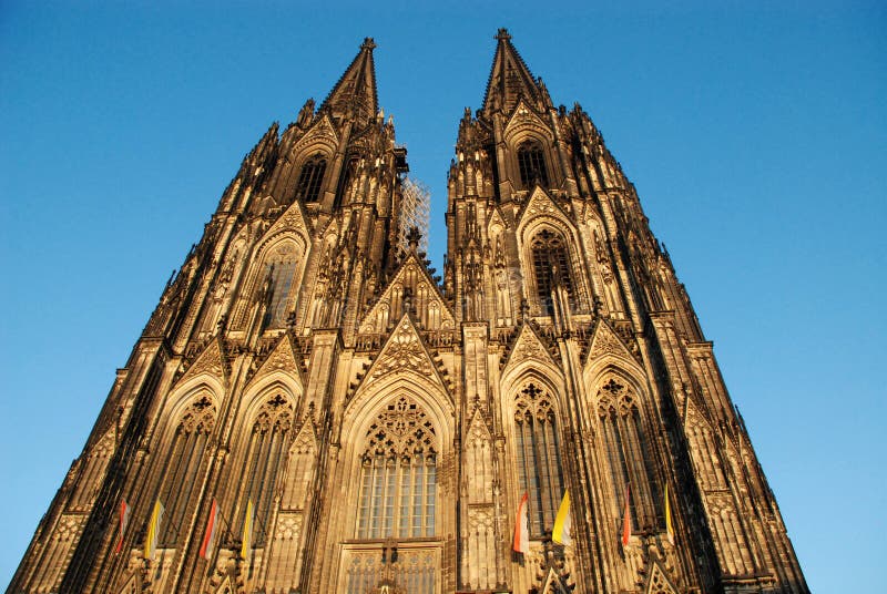 Cologne Cathedral (Kolner Dom, official name Hohe Domkirche St. Peter und Maria) is one of the best-known architectural monuments in Germany and has been Cologne's (Koln's) most famous landmark since its completion in the late 19th century. The cathedral is under the administration of the Roman Catholic Church and is the seat of the Archbishop of Cologne. From 1880, when its spires were completed, it was the world's tallest structure, losing its title on the completion of the Washington Monument in Washington DC, 1884. Cologne Cathedral remains the second-tallest Gothic structure in the world; only the steeple of the Ulm Munster is higher. Construction of the gothic church began in 1248 and took, with interruptions, more than 600 years to complete - it was finally finished in 1880. The two towers are 157m tall, the cathedral is 144m long and 86m wide. The cathedral is dedicated to Saints Peter and Mary. It was built on the site of a 4th century Roman temple, a square edifice known as the 'oldest cathedral' and commissioned by Maternus, the first Christian bishop of Cologne. A second church built on the site, the so-called Old Cathedral, was completed in 818. This burned down on April 30, 124. Cologne Cathedral (Kolner Dom, official name Hohe Domkirche St. Peter und Maria) is one of the best-known architectural monuments in Germany and has been Cologne's (Koln's) most famous landmark since its completion in the late 19th century. The cathedral is under the administration of the Roman Catholic Church and is the seat of the Archbishop of Cologne. From 1880, when its spires were completed, it was the world's tallest structure, losing its title on the completion of the Washington Monument in Washington DC, 1884. Cologne Cathedral remains the second-tallest Gothic structure in the world; only the steeple of the Ulm Munster is higher. Construction of the gothic church began in 1248 and took, with interruptions, more than 600 years to complete - it was finally finished in 1880. The two towers are 157m tall, the cathedral is 144m long and 86m wide. The cathedral is dedicated to Saints Peter and Mary. It was built on the site of a 4th century Roman temple, a square edifice known as the 'oldest cathedral' and commissioned by Maternus, the first Christian bishop of Cologne. A second church built on the site, the so-called Old Cathedral, was completed in 818. This burned down on April 30, 124