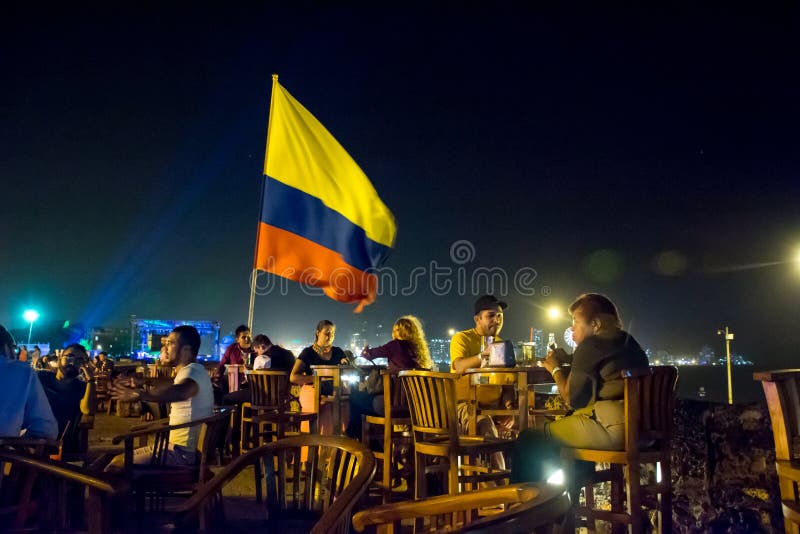 Colombia's flag waving at cafe del mar, Cartagena, Colombia. December 2014