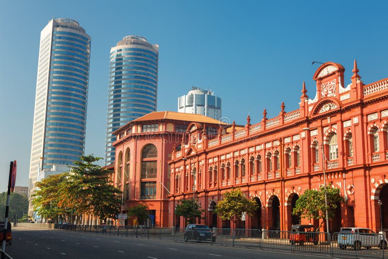 Colombo, Sri Lanka - 11 February 2017: The red building of Cargills and Miller in York Street with the skyscrapers of World Trade