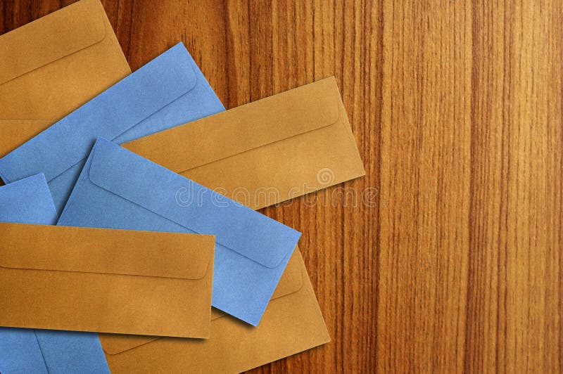 Color envelope isolated on the wooden